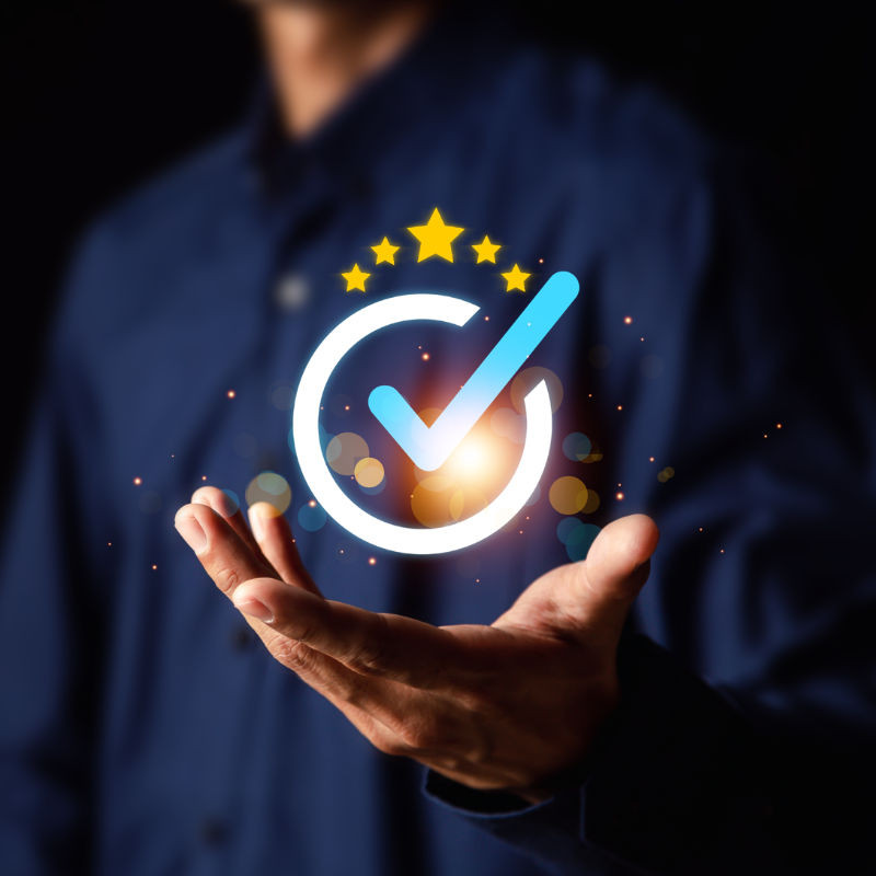 Man holding a checkmark